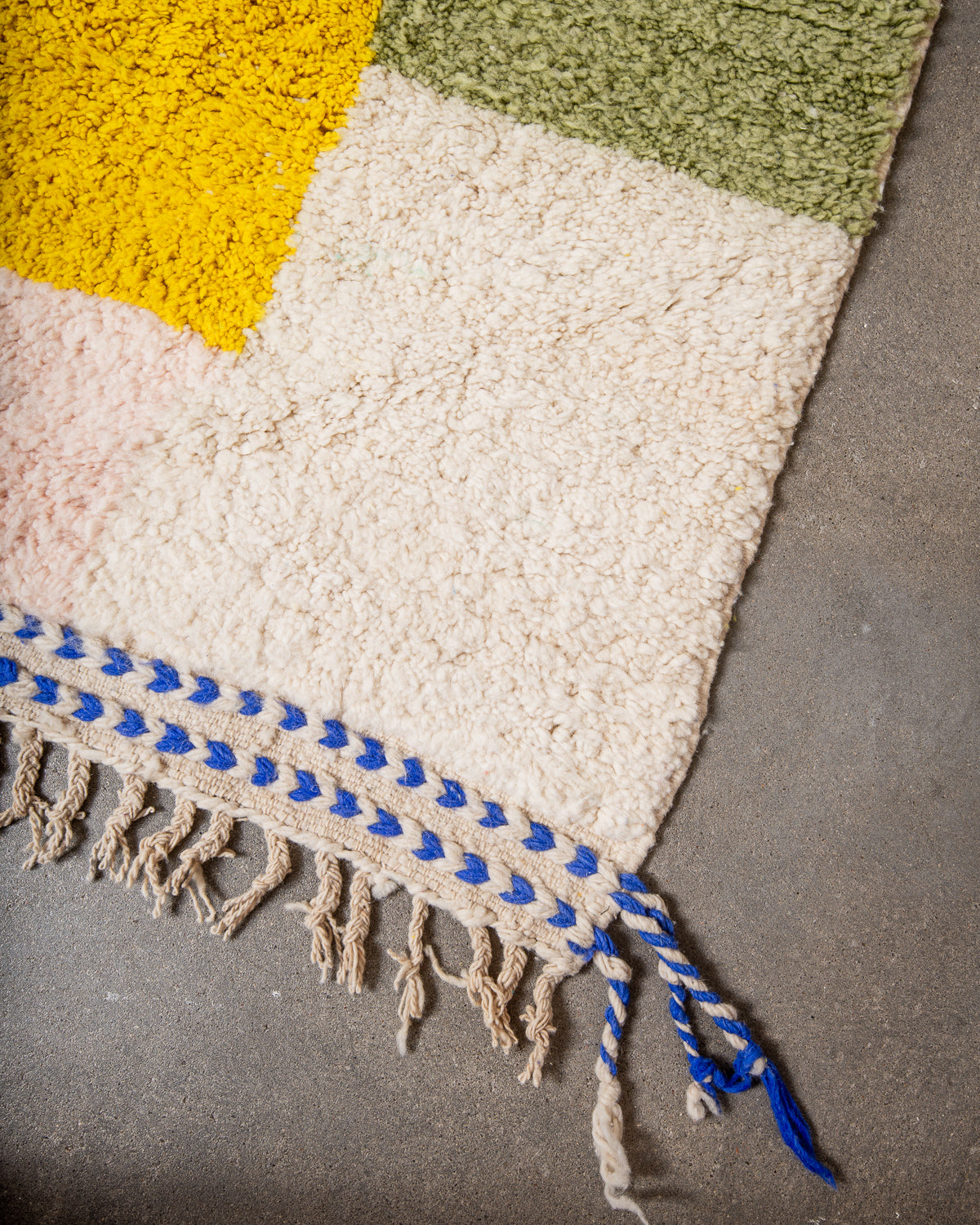 Modern, designer, handcrafted Berber rug from Morocco. Beniourain carpet with beautiful colours and patterns and fluffy wool texture.